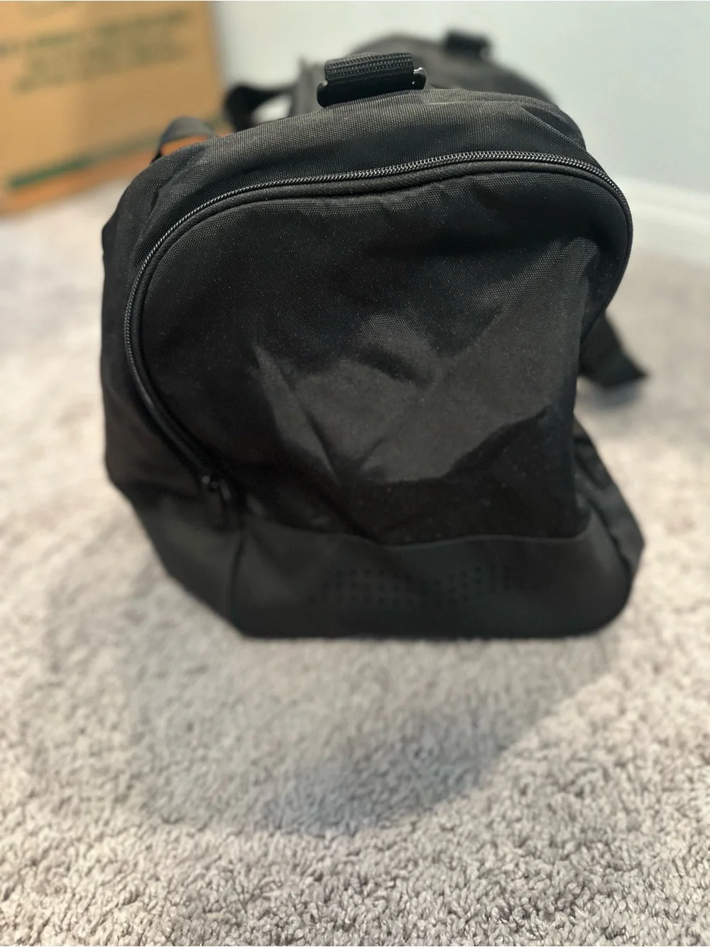 black adidas Defender duffel bag with White Logo
